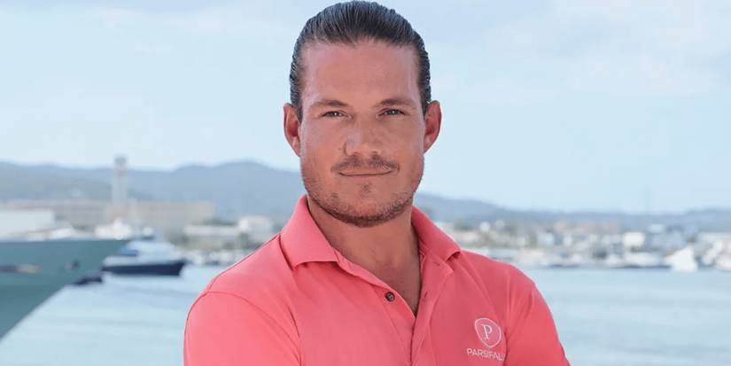 gary king in official photo of below the deck sailing yacht soft smiling yachts in background