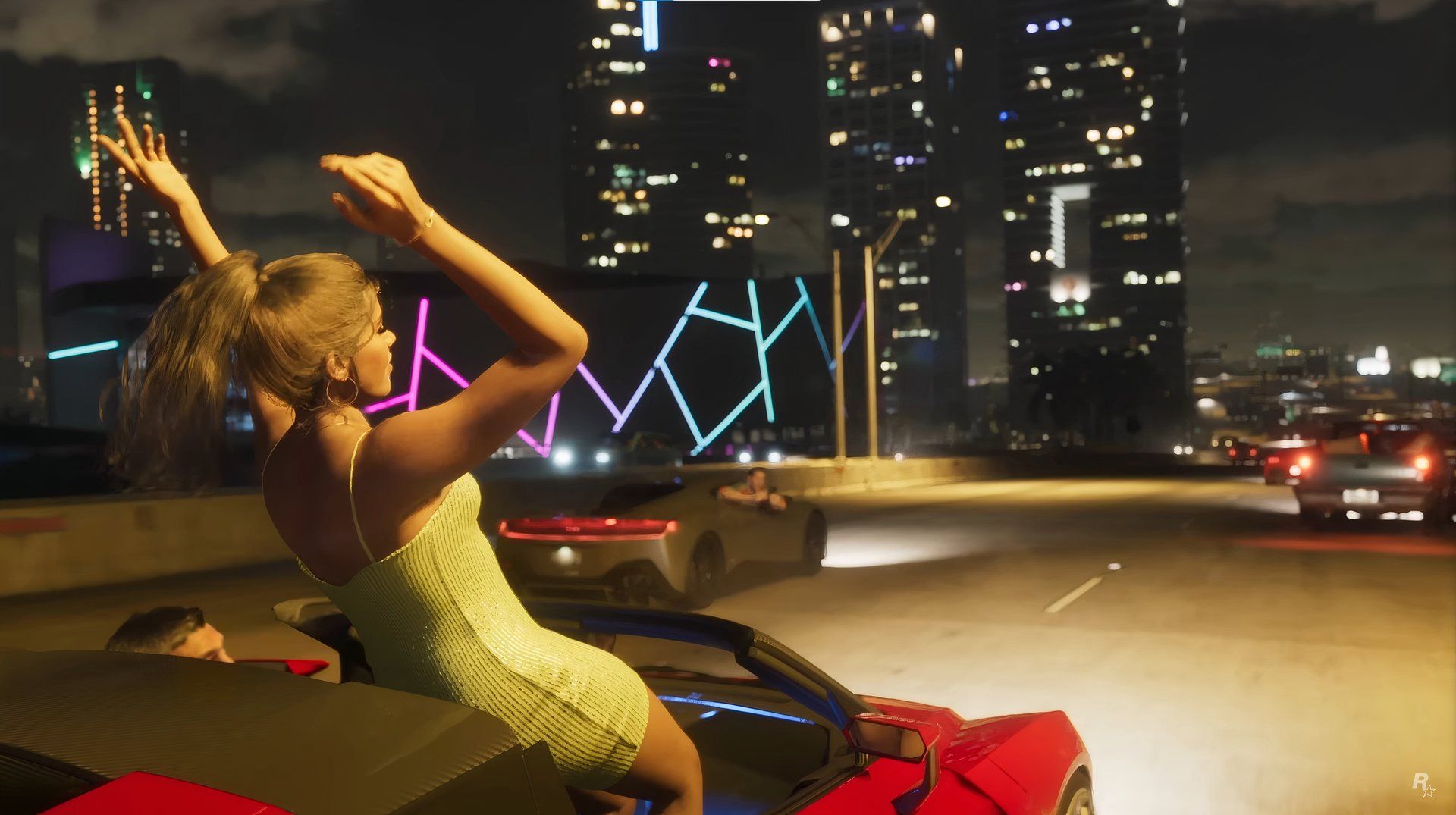 A woman with her arms up riding in a convertible in the GTA6 trailer