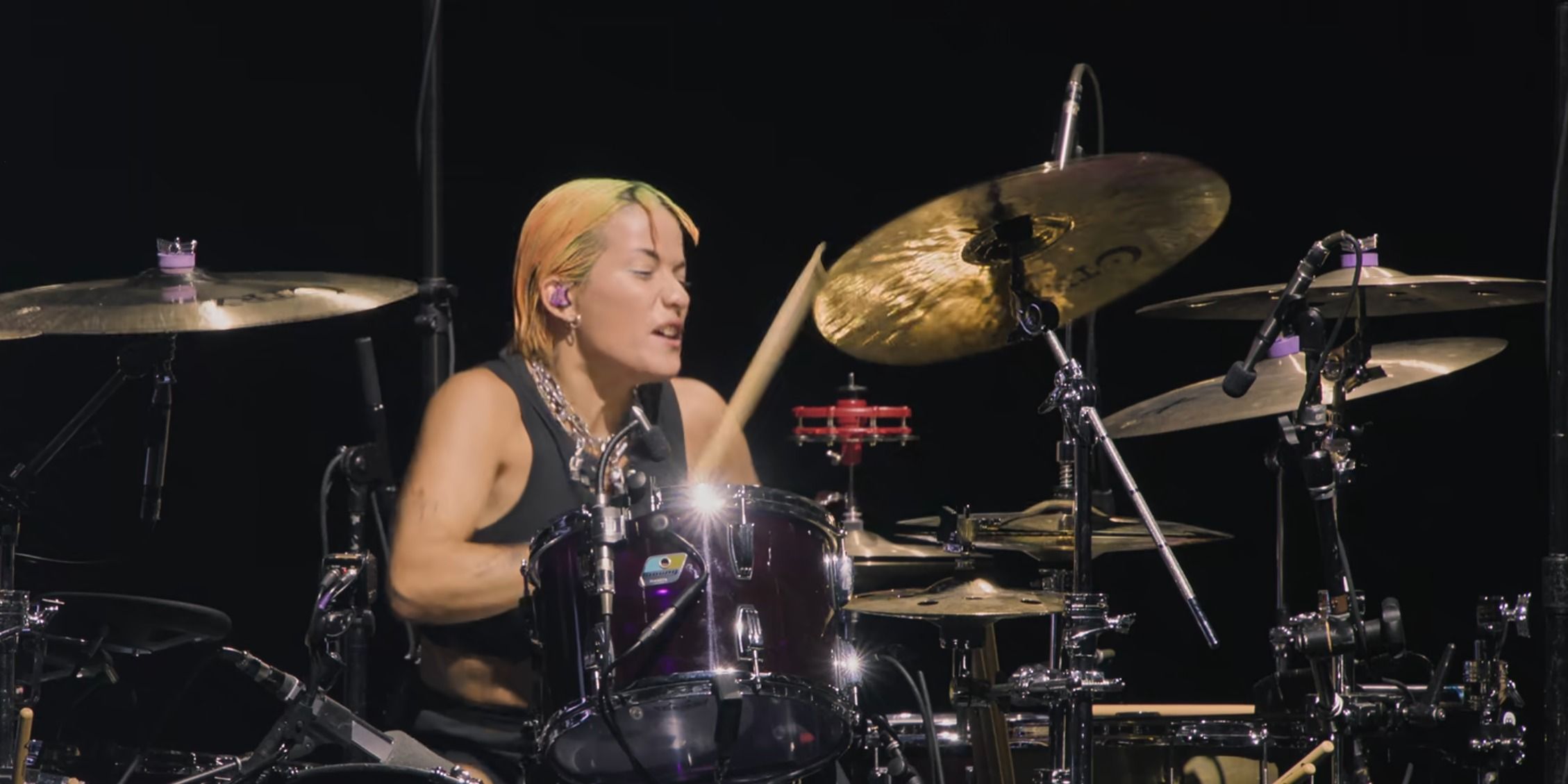 Hayley Brownell playing drums in GUTS World Tour