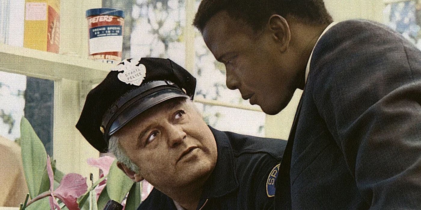 Sidney Poitier’s Tibbs stares at a cop, who stares back in the film In the Heat of the Night 1967