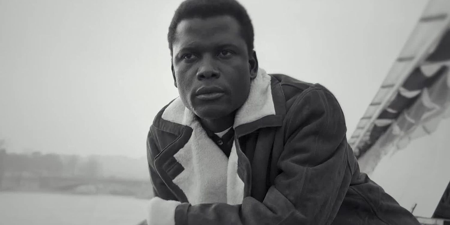 A black and white image of actor Sidney Poitier looking off into the distance as seen in the documentary Sidney 2022