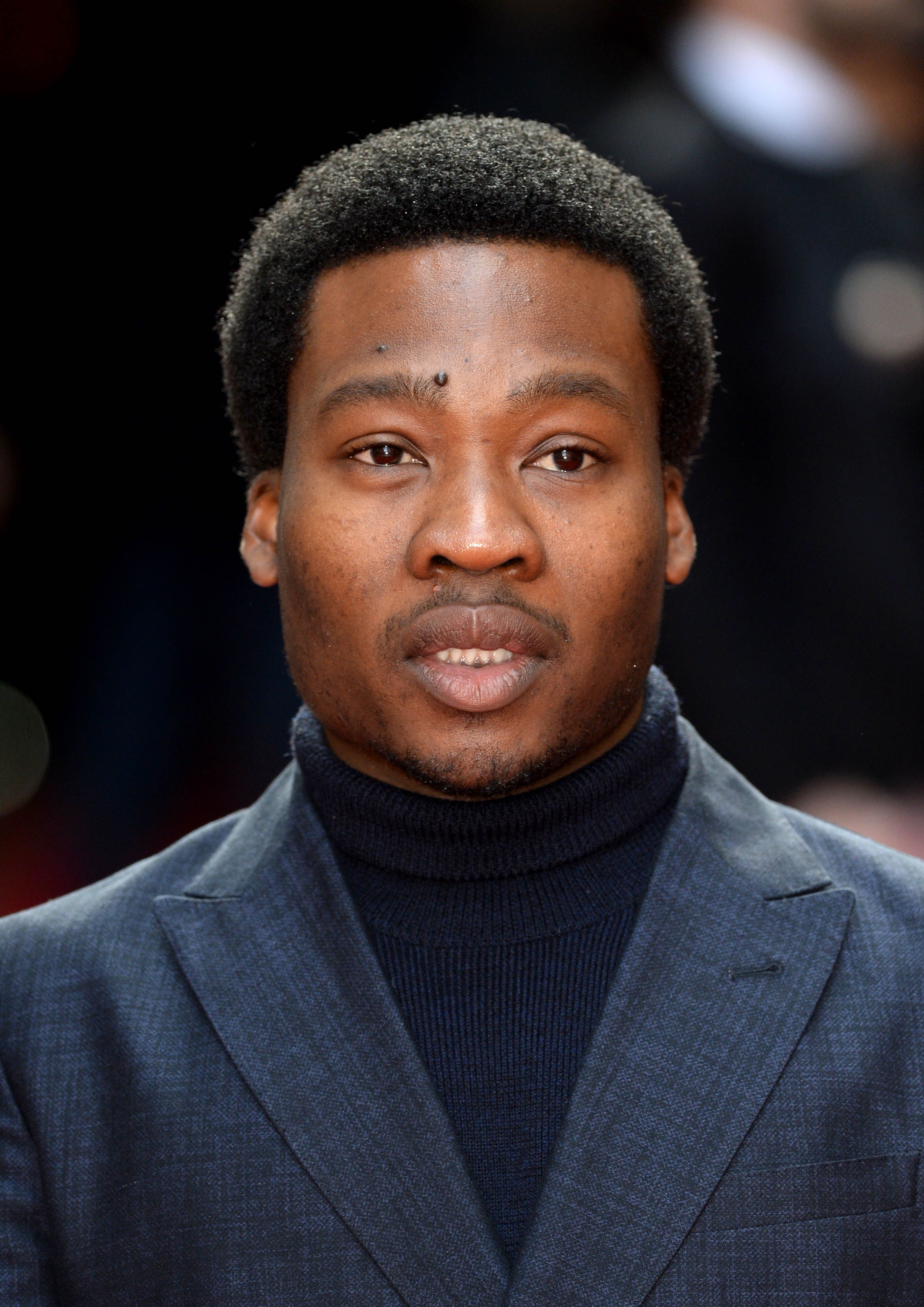 Headshot Of Fisayo Akinade
