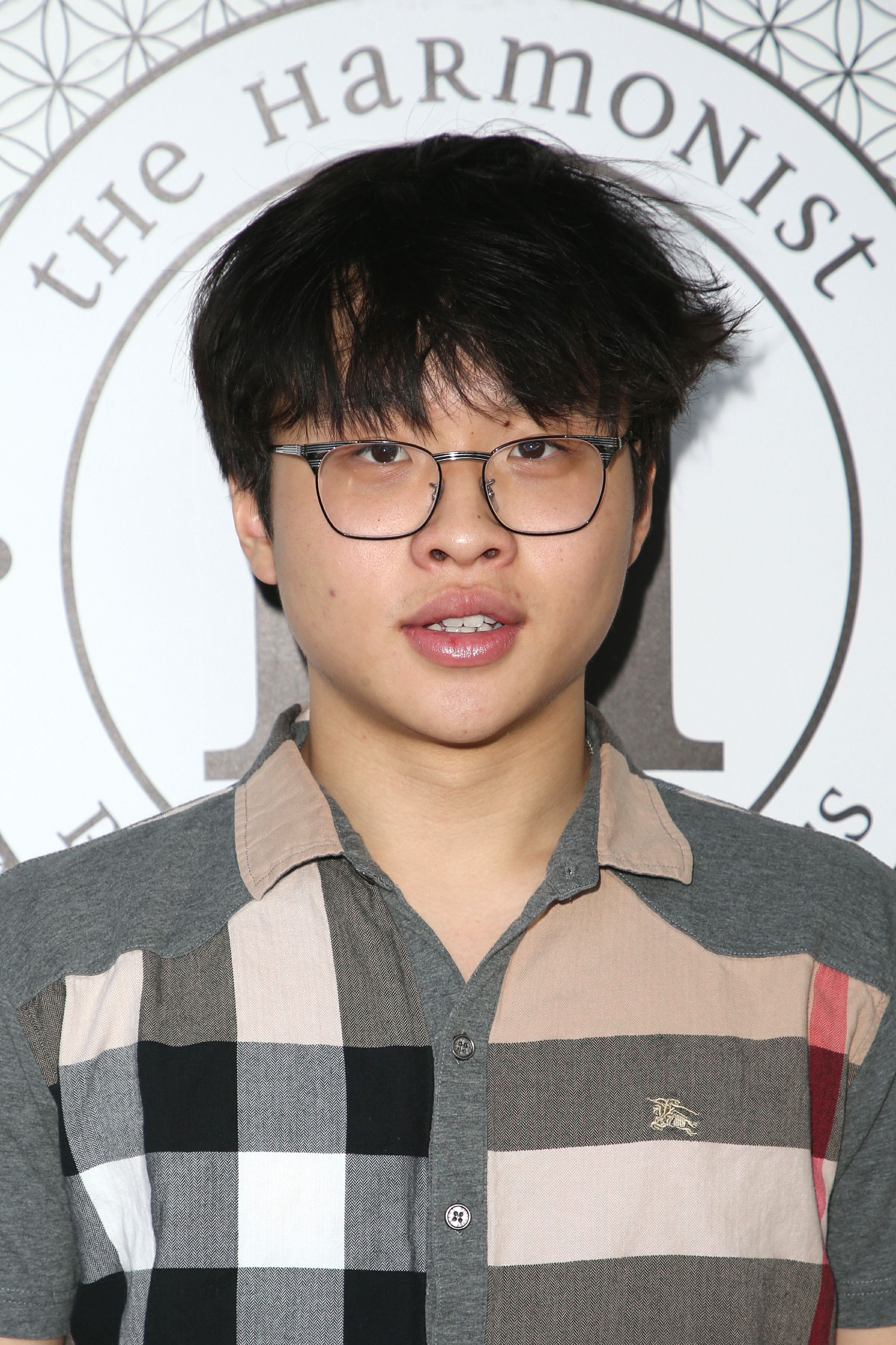 Headshot Of Kenny Ridwan