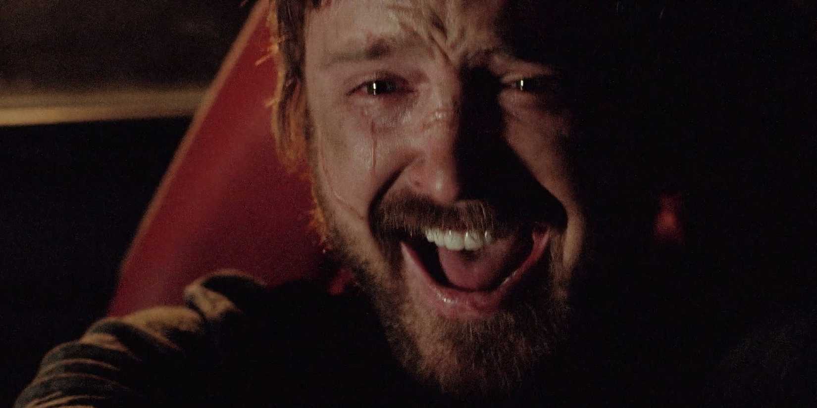 Jesse Pinkman (Aaron Paul) crying, laughing, and smiling in his last scene in Breaking Bad 