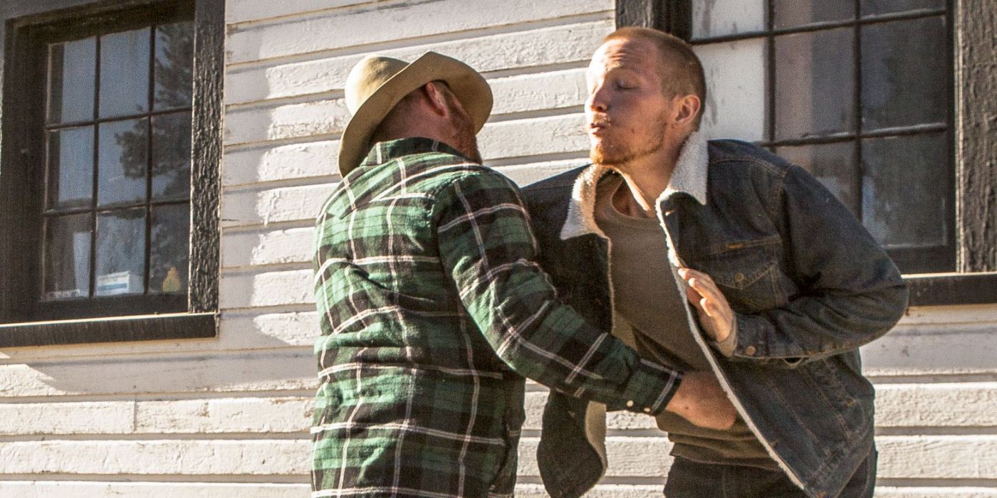 JImmy (Jefferson White) in a fight with Fred (Luke Peckinpah) in Yellowstone