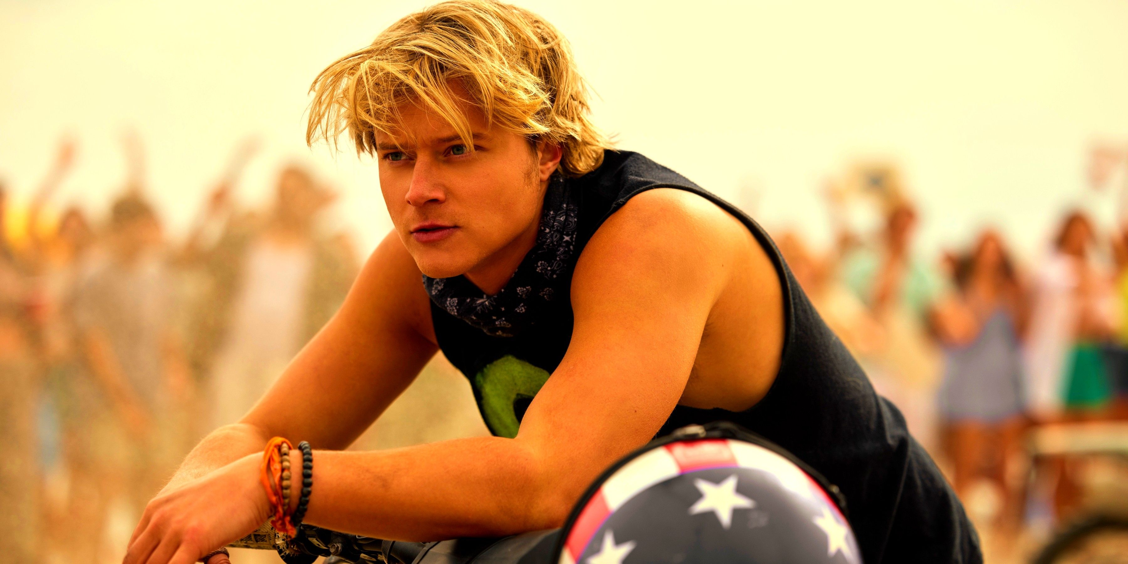 JJ Maybank (Rudy Pankow) leaning on his motorbike in Outer Banks season 4