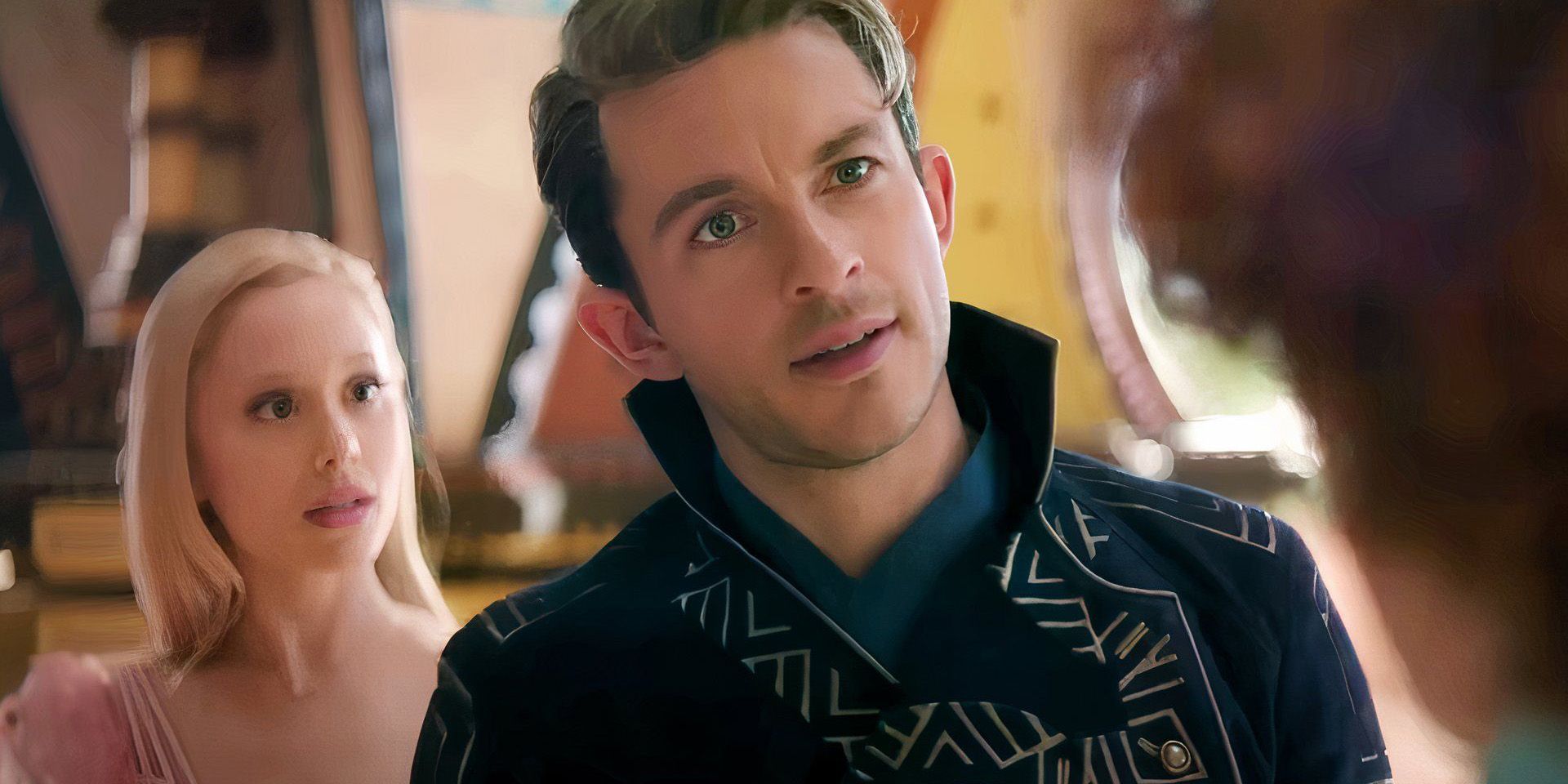 Jonathan Bailey as Fiyero with his head cocked in Wicked movie