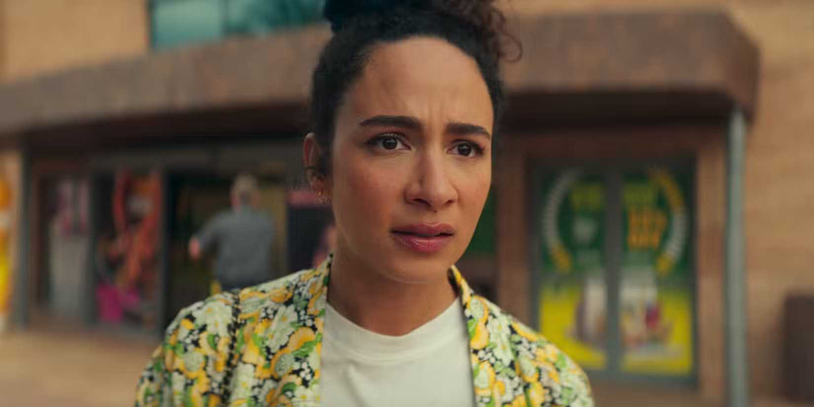 Aurora Perrineau as Riddy looking concerned in Kaos