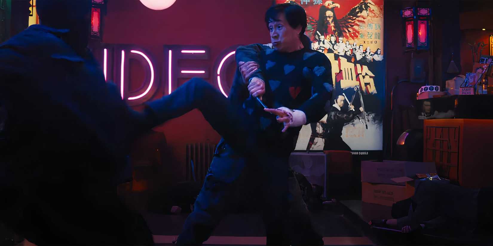 Ke Huy Quan's Marvin looking worried while fighting multiple people in Love Hurts