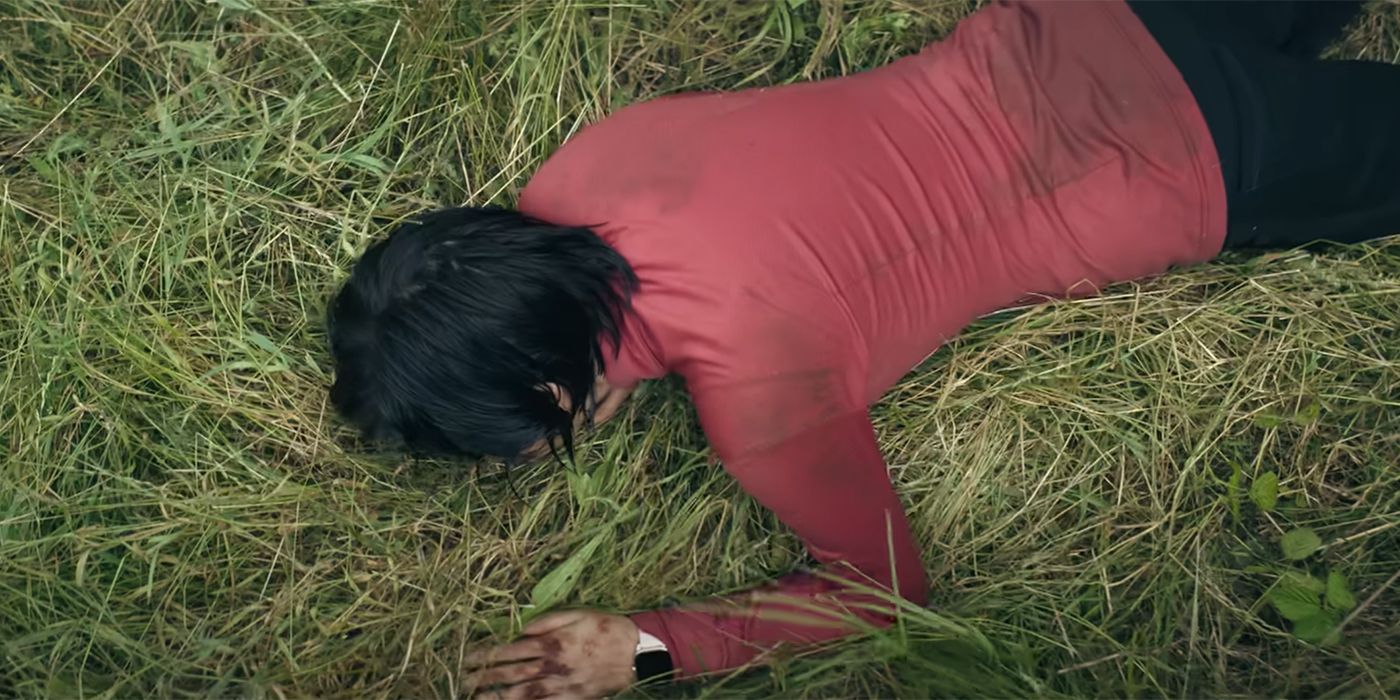 Kelsey Asbille lying in the grass in Don't Move