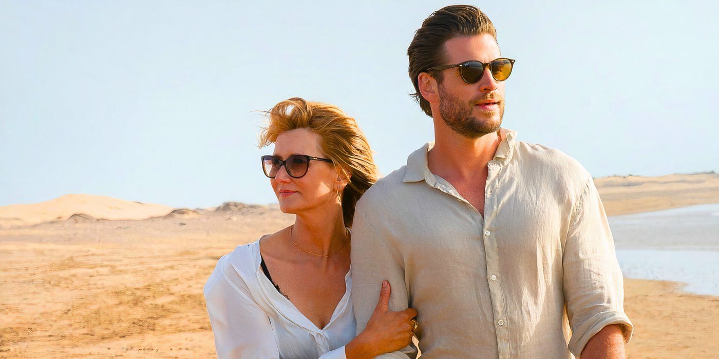 Laura Dern as Katherine and Liam Hemsworth as Owen walking on the beach in Lonely Planet