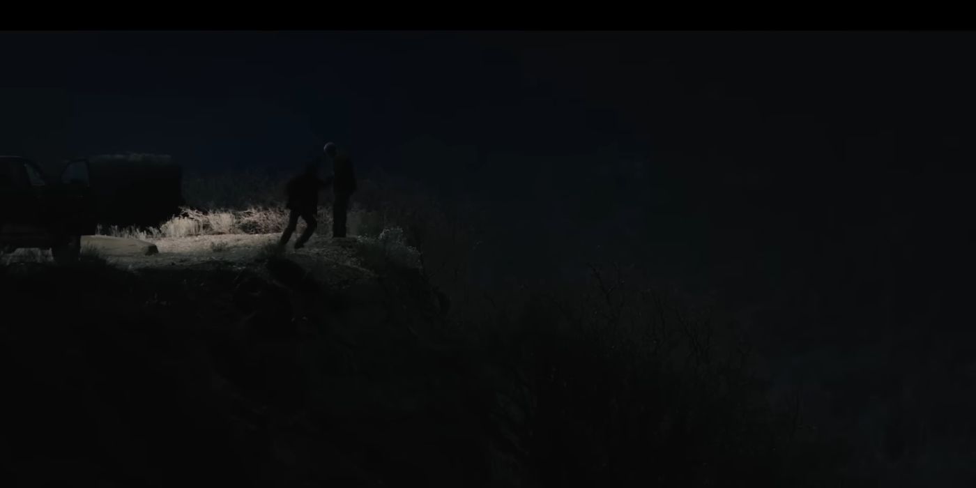 Lloyd (Forrie Smith) shoving Fred (Luke Peckinpah) into the ravine at the train station in Yellowstone