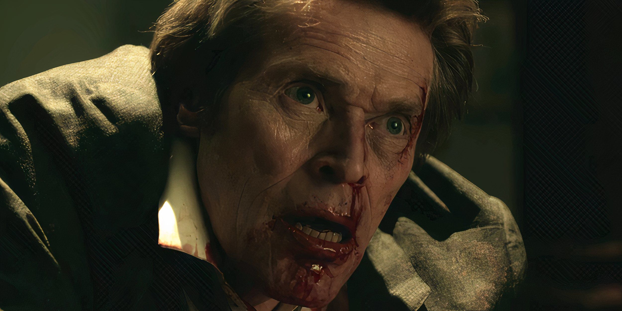 Marcus (Willem Dafoe) covered in blood in John Wick