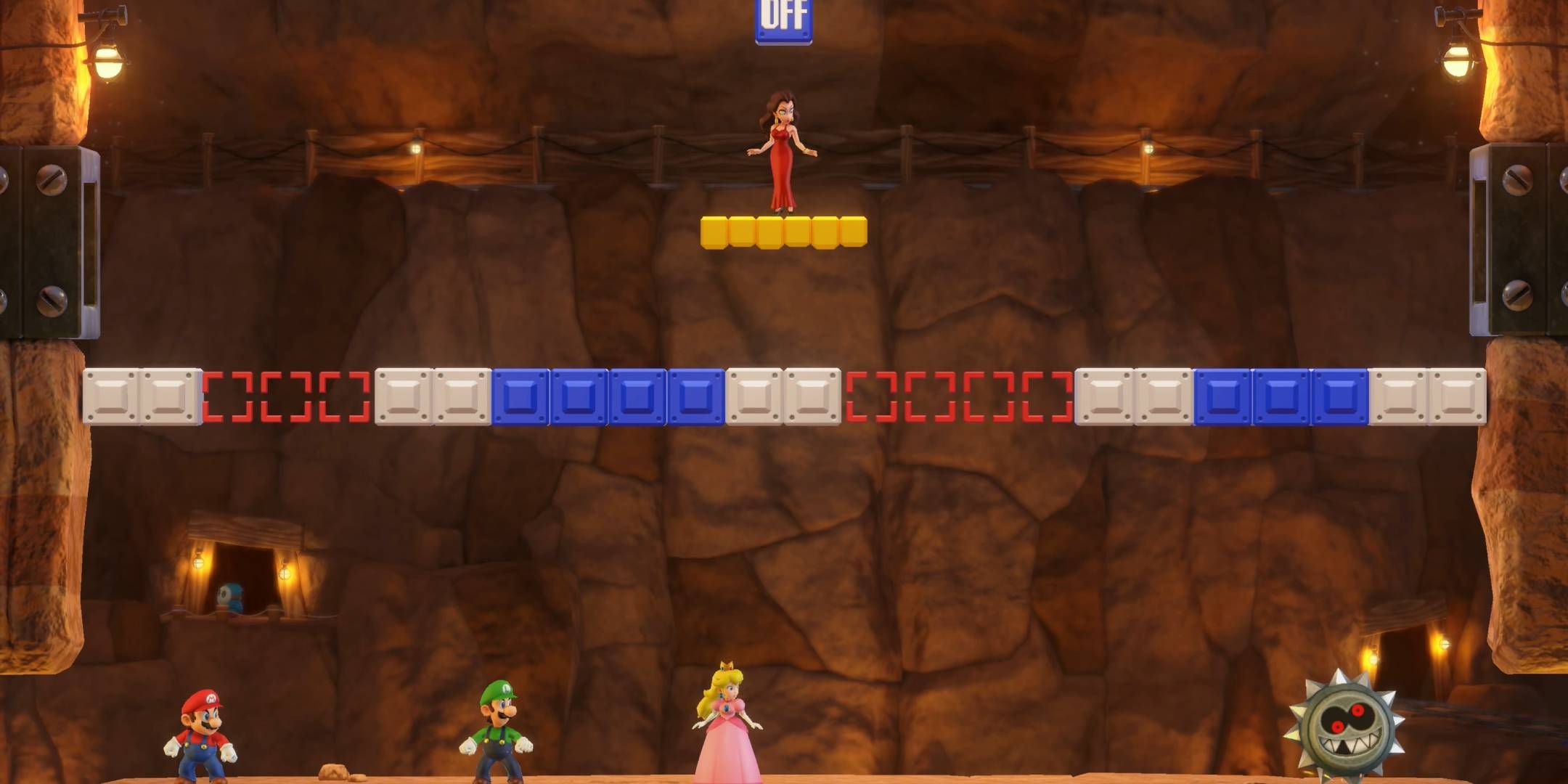 Pauline estava em uma plataforma amarela acima de Mario, Luigi e Peach, que estão olhando para uma roda com pontas no minijogo Mario Party Jamboree On-Again Off-Again.