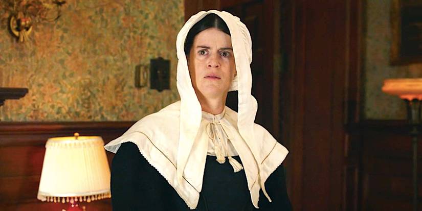 Mary Holland's Patience looking worried in the living room from Ghosts season 4 episode 2