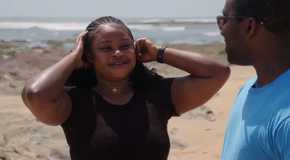Matilda Nti in 90 Day Fiance holding her head at beach with Niles