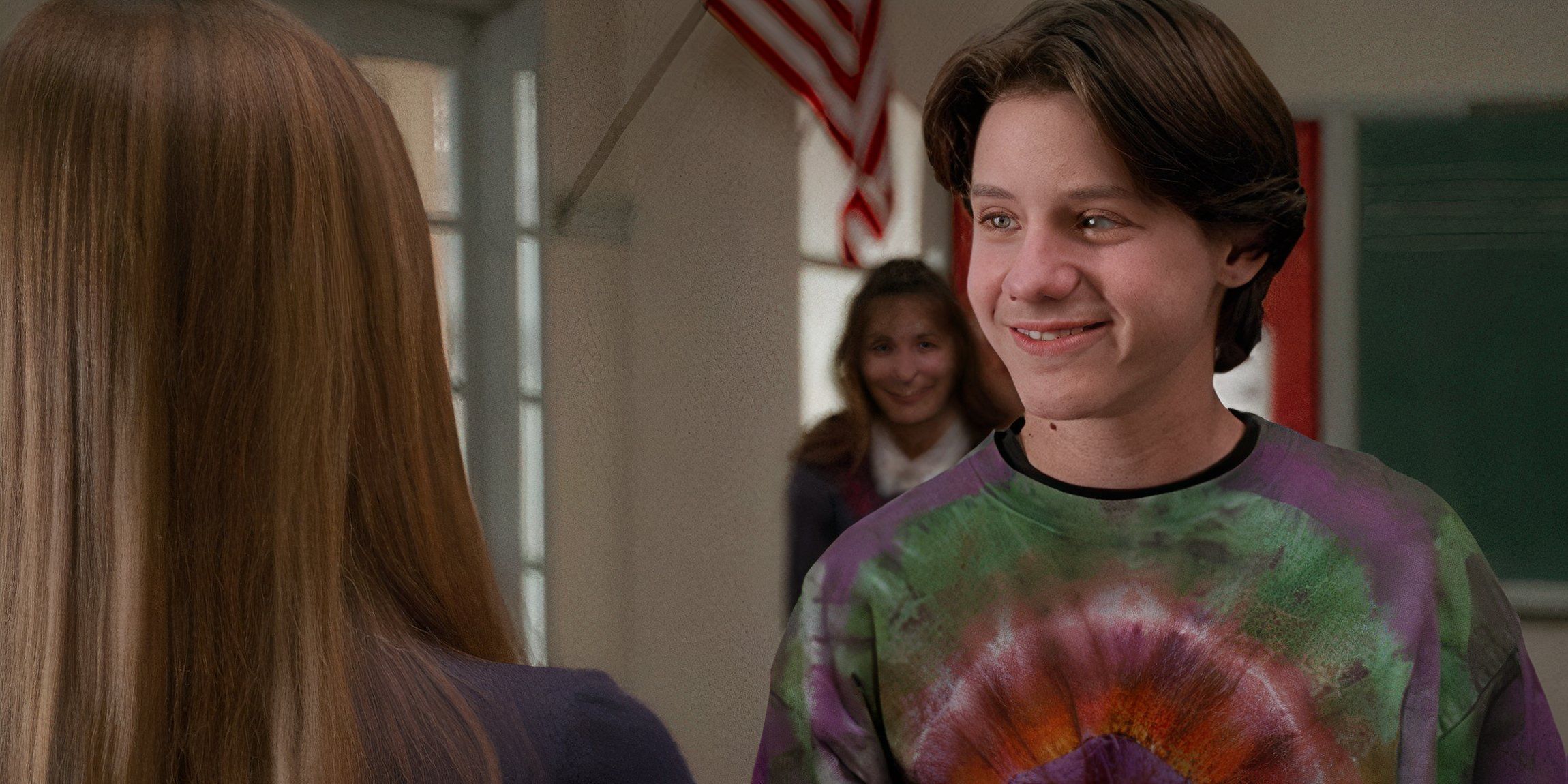 Max smiling in his tie-dyed shirt in Hocus Pocus