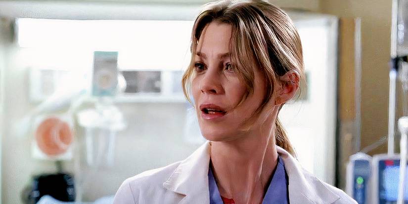 Meredith Grey looks shocked while in a patient's room in Grey's Anatomy