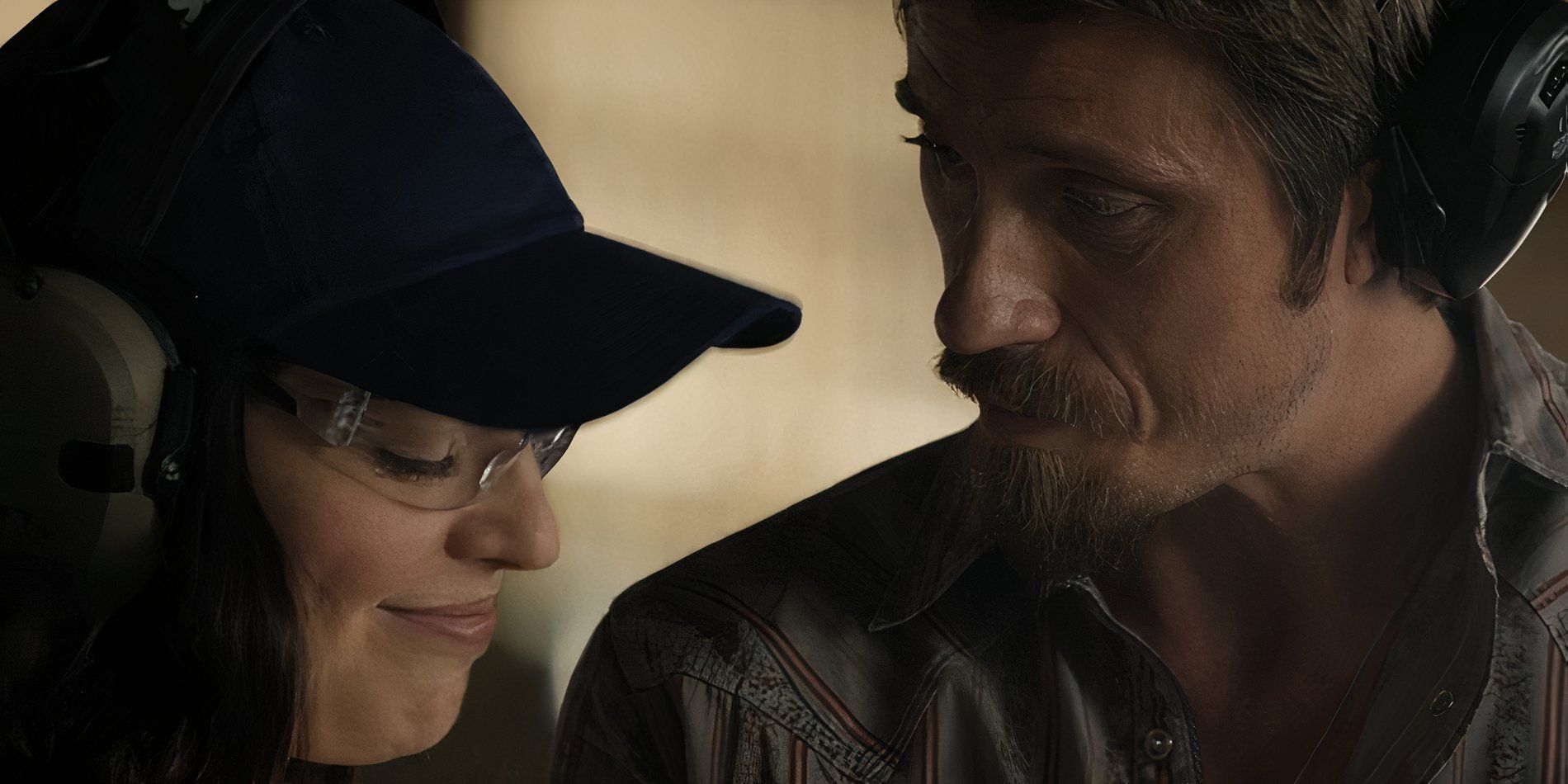 Tina Manfredi (Tatiana Zappardino) and Mitch Keller (Garrett Hedlund) flirting at a shooting range in Tulsa King season 2, episode 6