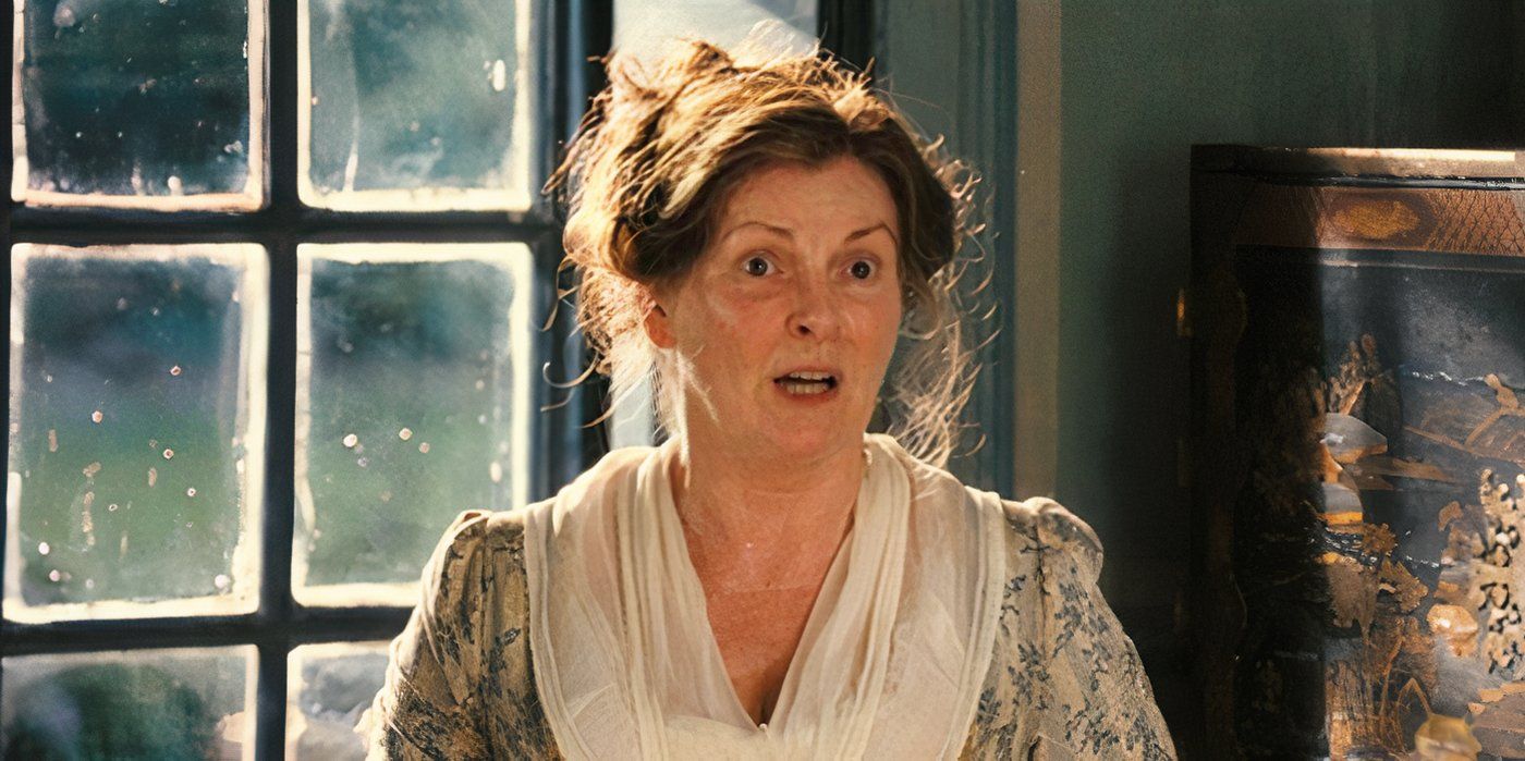 Mrs Bennet talking by a window in Pride and Prejudice 2005