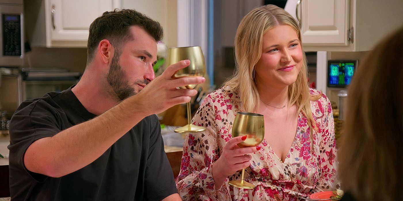 Love Is Blind season 7 Hannah Jiles & Nick Dorka toasting as Hannah smiles