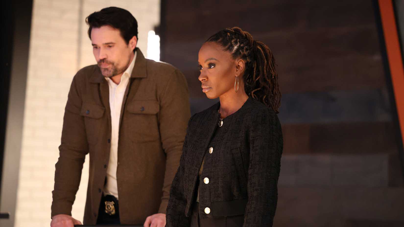 Gabi and Trent standing next to each other in Found season 2.