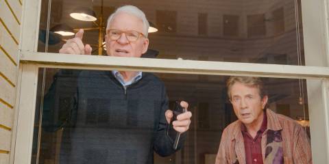 Charles (Steve Martin) and Oliver (Martin Short) looking shocked through the window in Only Murders in the Building Season 4 Ep 10