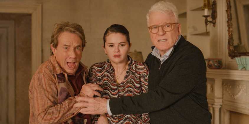Oliver (Martin Short), Charles (Steve Martin), and Mabel (Selena Gomez) being threatened by Marshall P. Pope in Only Murders in the Building Season 4 Ep 10