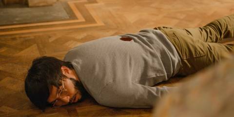 Marshall P. Pope (Jin Ha) gets shot in the back in Only Murders in the Building Season 4 Ep 10