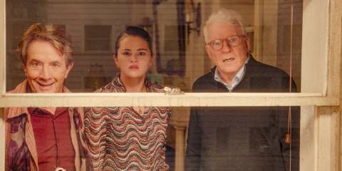 Oliver (Martin Short), Mabel (Selena Gomez), and Charles (Steve Martin) looking shocked while looking through the window in Only Murders in the Building Season 4 Ep 10.