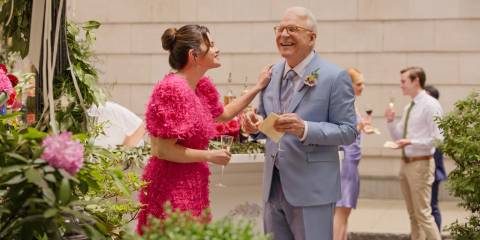 Mabel (Selena Gomez) and Charles (Steve Martin) having a good time at Oliver and Loretta's wedding in Only Murders in the Building Season 4 Ep 10