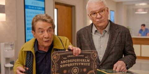 Oliver (Martin Short) and Charles (Steve Martin) showing an Ouija board in Only Murders in the Building Season 4 Episode 9