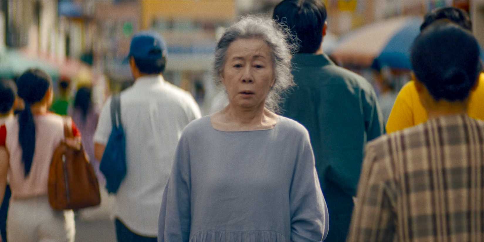Older Sunja (Youn Yuh-jung) contemplating what to say to Kato in Pachinko Season 2 Episode 8