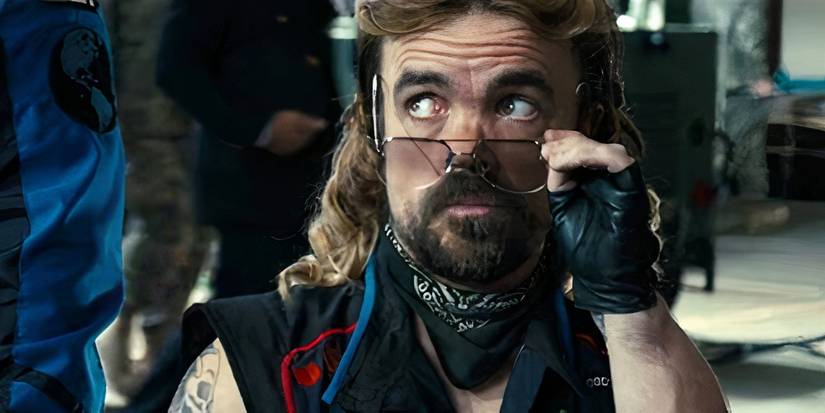 Eddie (Peter Dinklage) adjusting his glasses in Pixels (2015)