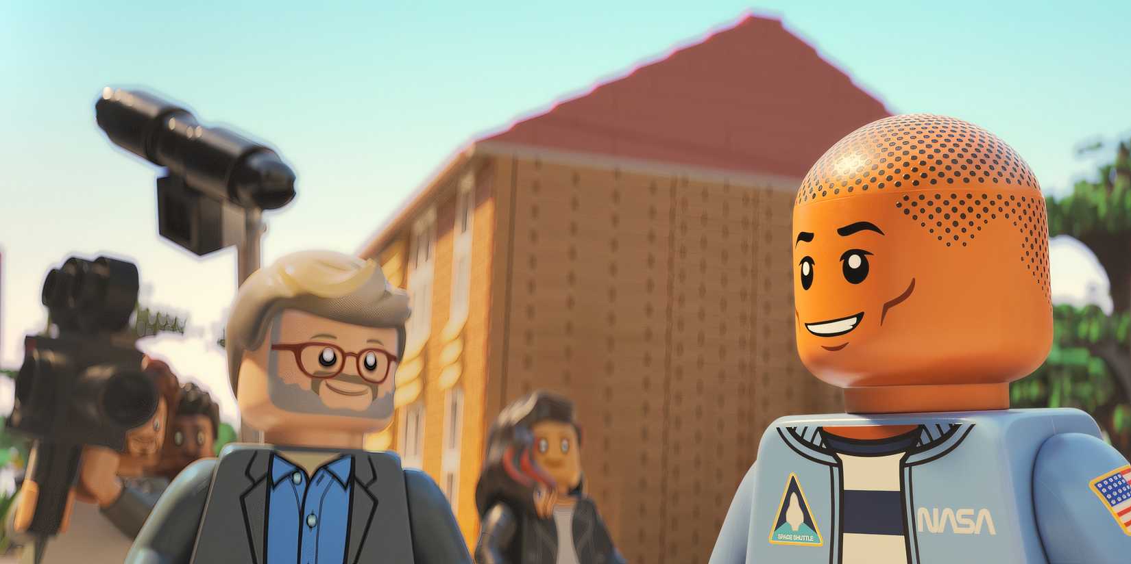 Pharrell Williams smiles at Morgan Neville in Piece by Piece