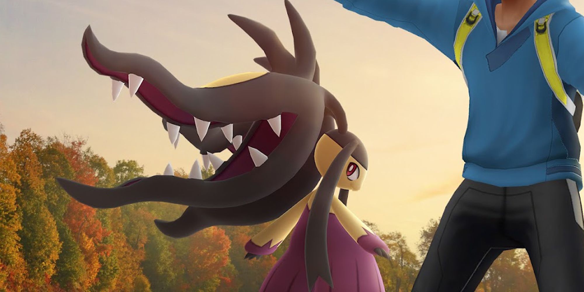 Mega Mawile standing next to a trainer in Pokemon GO