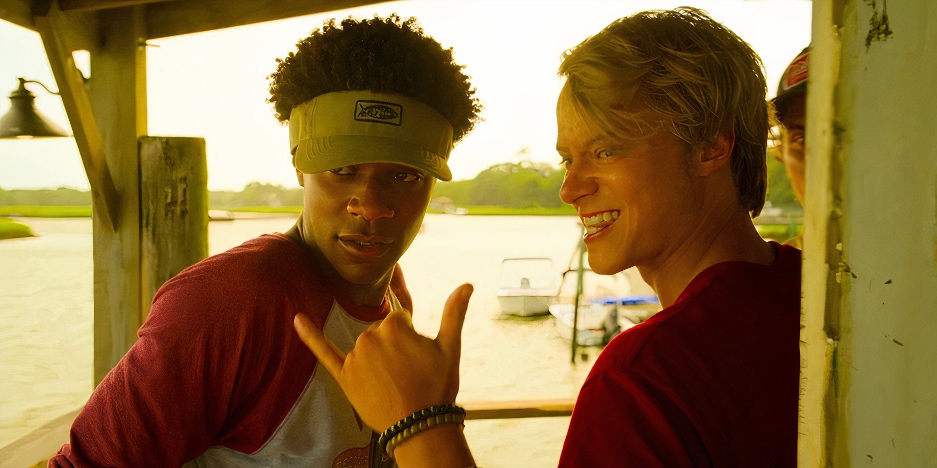 Pope and JJ on the dock in Outer Banks season 4