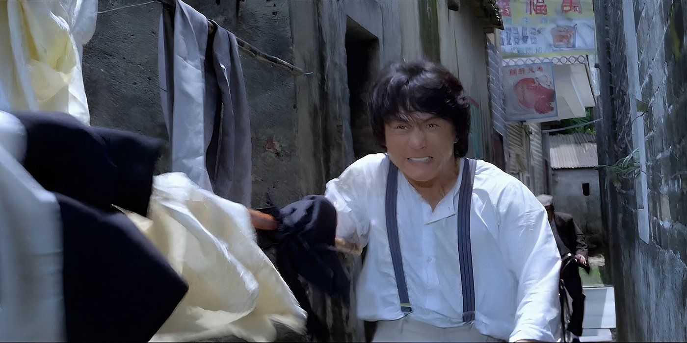 Project A Jackie Chan On A bicycle with a pole full of clothes