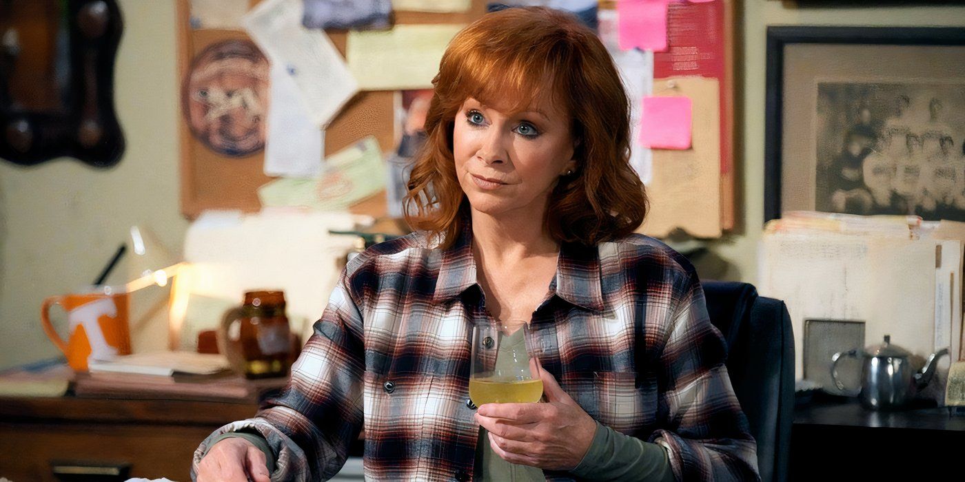 Reba McEntire holding a drink in Happy's Place