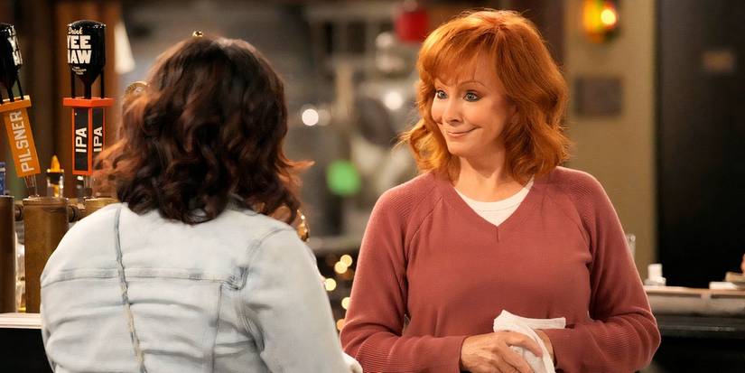 Reba McEntire smiles at Isabella in Happy's Place