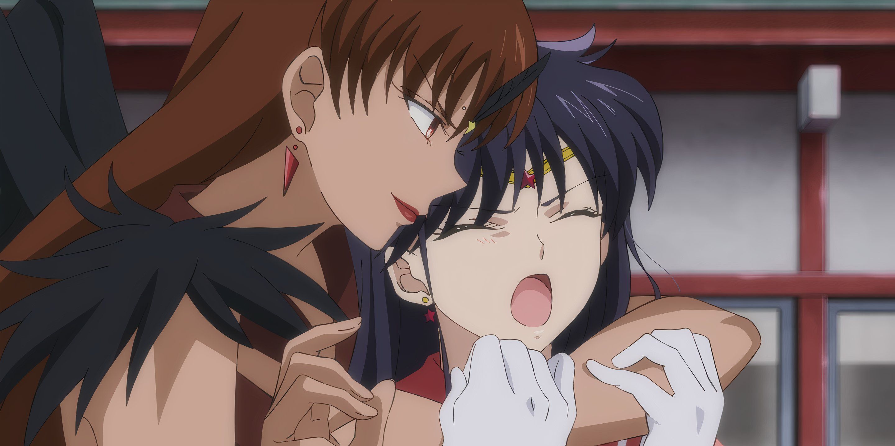 Sailor Lead Crow has Sailor Mars in a headlock.