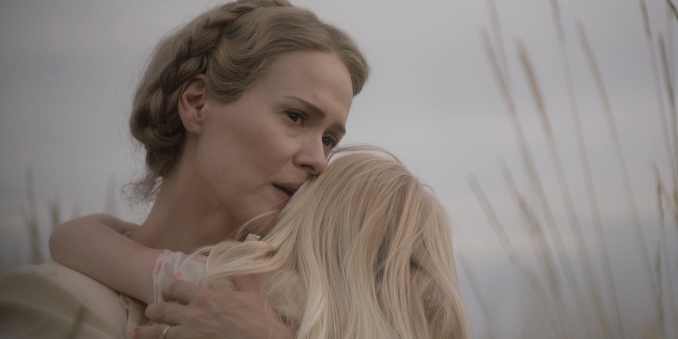 Sarah Paulson as Margaret looking sad while hugging Alona Jane Robbins' Ollie in Hold Your Breath