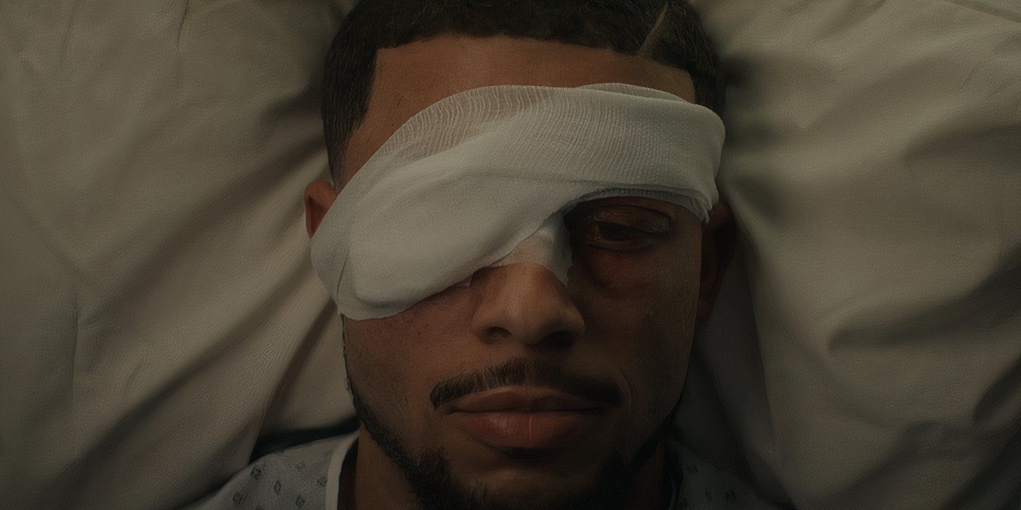 Sherrod with eye covered in American Sports Story episode 7