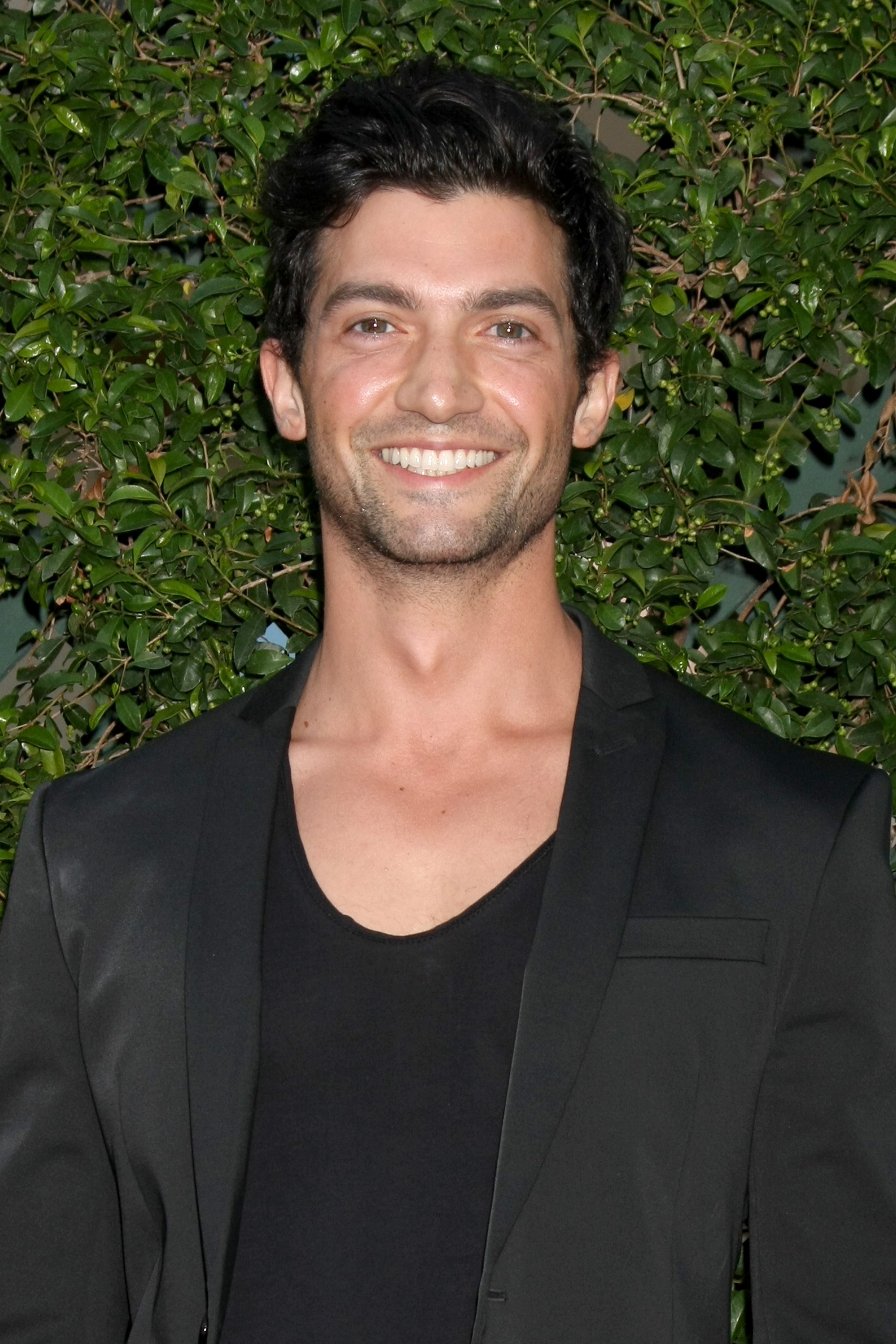 Headshot Of David Alpay