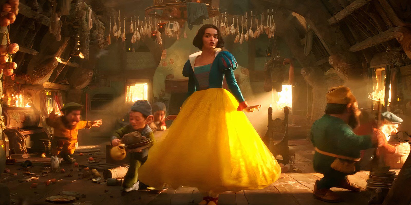 Snow White dancing with the seven dwarves in the new live-action movie Snow White