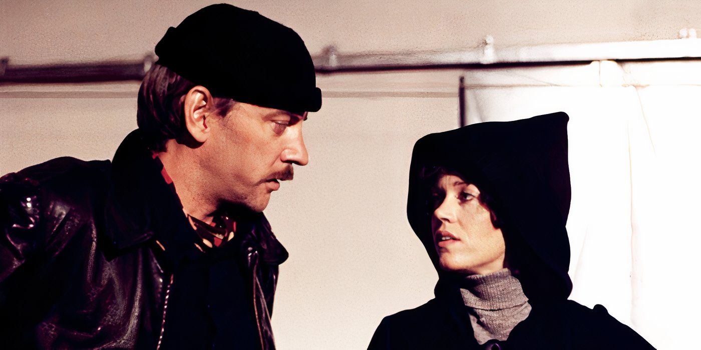 Steelyard Blues (1973) Donald Sutherland Plays Jesse Veldini talking to female co-star, Donald wearing a hat with a moustache