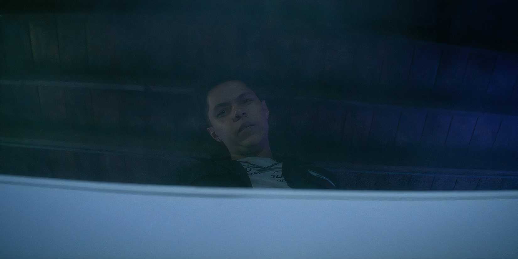 Stony Blyden as Trey looking curiously into a freezer in Goosebumps The Vanishing