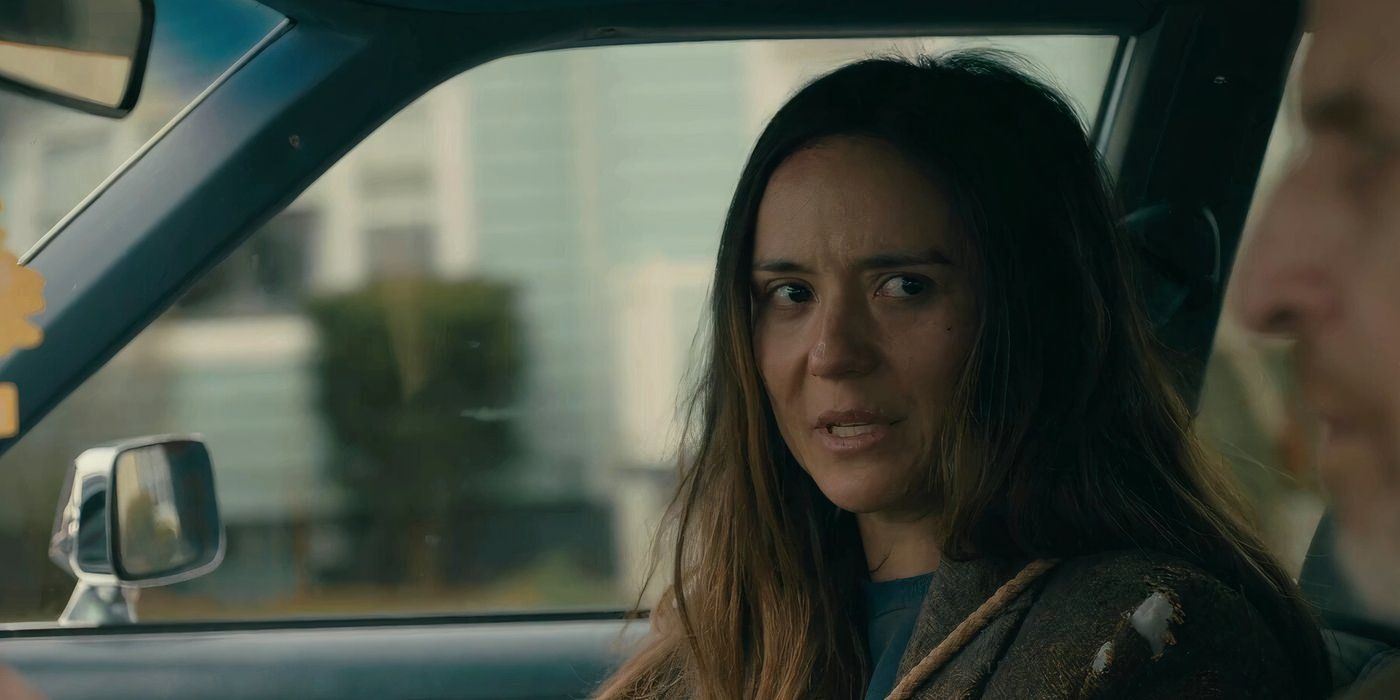 Tabitha looks upset in the car in From season 3, episode 3