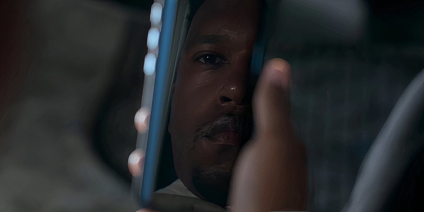 Tariq looking at his reflection in Power Book II Ghost