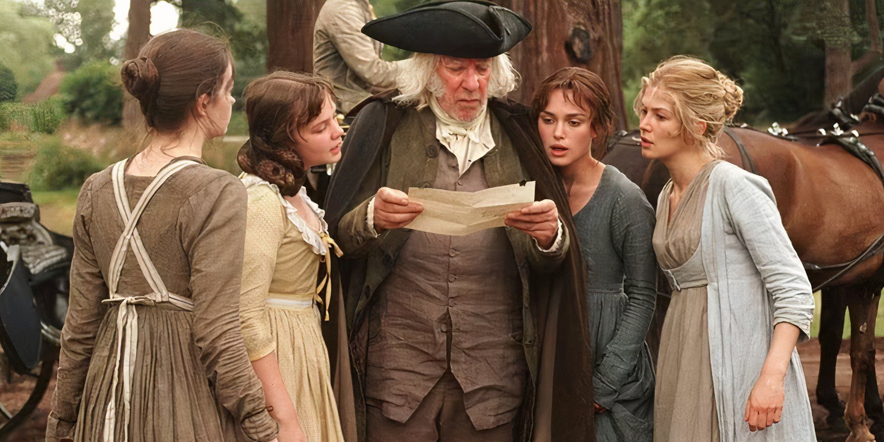 The Bennet sisters with their father while he reads a letter in Pride and Prejudice 2005